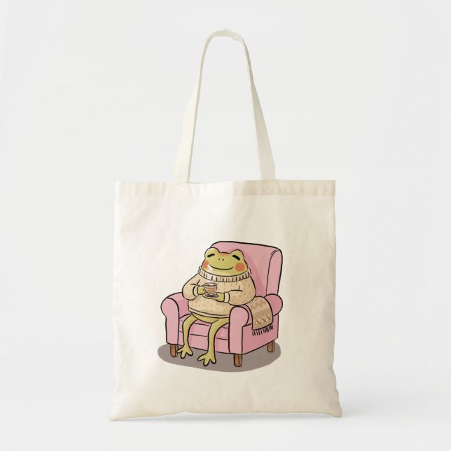 Cozy Frog Drinking Tea On Sofa Illustration Tygkasse (Framsidan)
