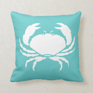 CRAB WHITE på tealblå kudde