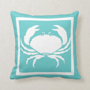 CRAB WHITE på tealblå kudde