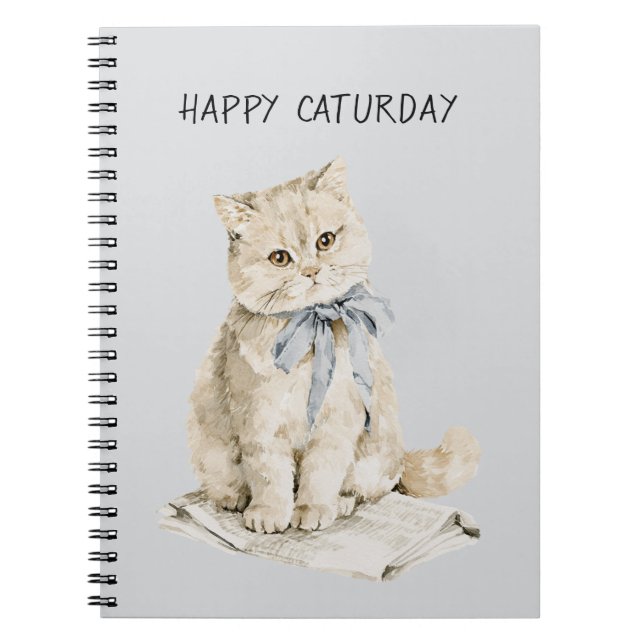 Cräm katt blå båge Caturday Anteckningsbok (Framsidan)
