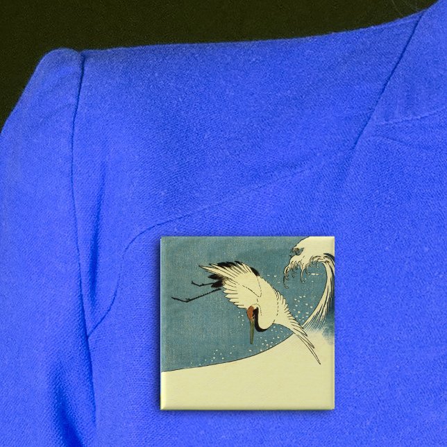 Crane in Ocean Wave Knapp (Black white crane bird flying over tall ocean wave on blue square pin back button.)