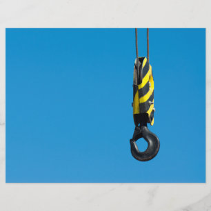 Crane krok med gult och svart rand hängande reklamblad