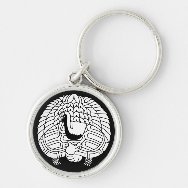 Crane och sköldpaddor rund silverfärgad nyckelring (Framsidan)
