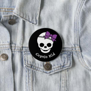Cranio Kid Girl Skull med Lila Bowtie Knapp