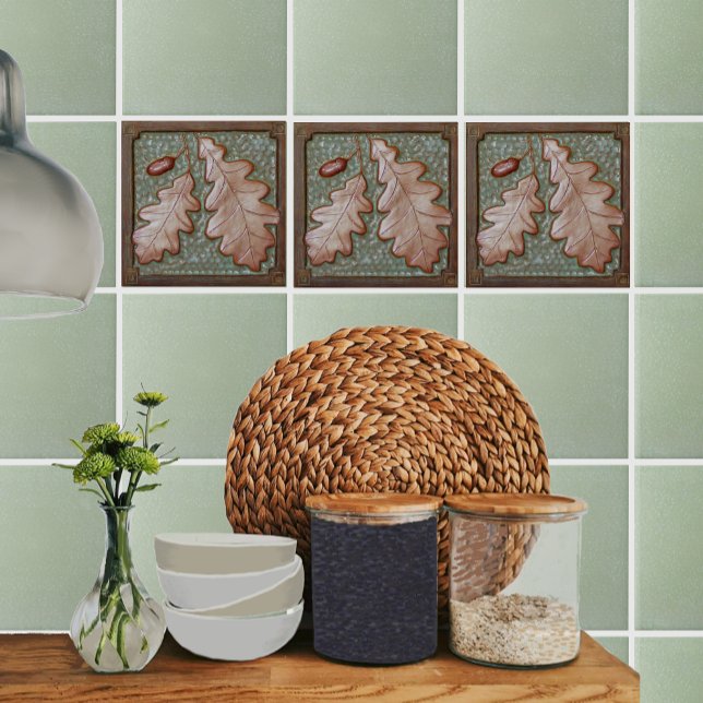 Crateur Oak löv Ceramic Decorative tile Kakelplatta (Green and copper Oak leaf tiles shown on a kitchen backsplash, with Fern greenfield tiles.)