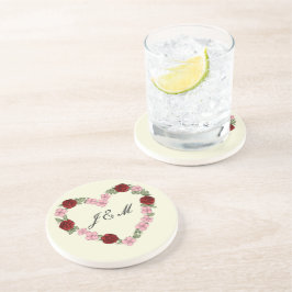 Cream stoneware coasters with a pink and red heart underlägg