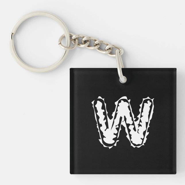 Creepy Monogram White på Black (Framsidan)