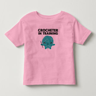 Crocheter i utbildningssmåbarnskjorta tee shirt