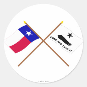 Crossed Texas och Gonzales Flaggor Runt Klistermärke