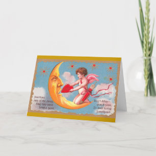 Cupid Matar hjärtat till Måne Valentine Helgkort