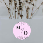 Custom Wedding Initial Sticker with Flowers Runt Klistermärke<br><div class="desc">Celebrate love in the smallest details with this elegant wedding monogram sticker, featuring the initials of the bride and groom surrounded by beautiful floral artwork. Perfect for sealing envelopes, favor bags, thank-you cards, or decorating gifts and wedding stationery. These customizable stickers add a romantic and personal touch to your wedding...</div>