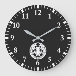 Cut bamboo in embracing bamboo leaves stor klocka