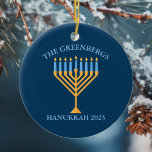 Cute Anpassningsbar Jewish Family Menorah Blue Han Julgransprydnad Keramik<br><div class="desc">Cute anpassningsbar Hanukkah-prydnadsföremål för en judisk familjegåva eller Chanukah party med synagog. Anpassa med ditt eget efternamn eller gruppinformation i blått runt söt blå menorah.</div>