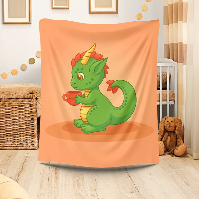 Cute Baby Dragon Holding Cup on Orange Fleecefilt (Skapare uppladdad)