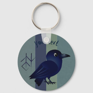 Cute baby raven med en symbol för visdom på Korf Nyckelring