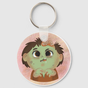 Cute boy i en Zombie Halloween-kostumchoklat Nyckelring
