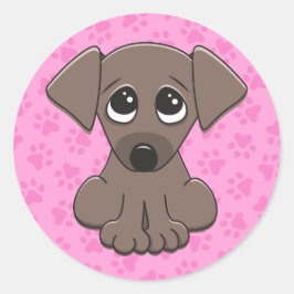 Cute, brun valp-hund på rosa sidutskrifts bakgrund runt klistermärke
