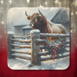 Cute Bull på en juljö i Rustic Farm Fyrkantigt Klistermärke<br><div class="desc">En vattenfärgad illustration av en scen på en rustik gård med en tjur som står bakom ett trästängsel som dekoreras i gräs på koner,  bär och trädgård en julvinterdag.</div>