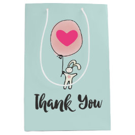 Cute Bunny Holger en ballong med Heart Tack