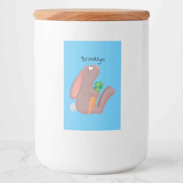 Cute bunny kanin sitta med tecknad av morot mat etikett (Framsida)