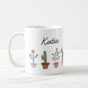 Cute cactus och blommor i en pott kaffemugg