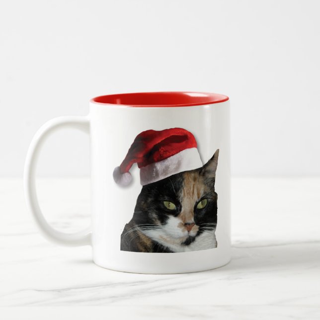 Cute Calico Cat Wearing Santa Hat Två-Tonad Mugg (Vänster)