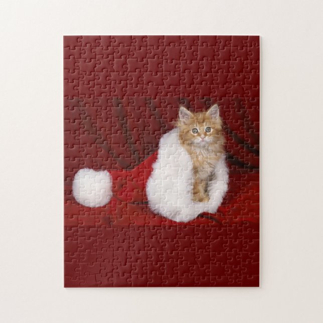 Cute Cat Pussel (A jigsaw puzzle features a long-haired orange cat sitting inside a Santa hat.)