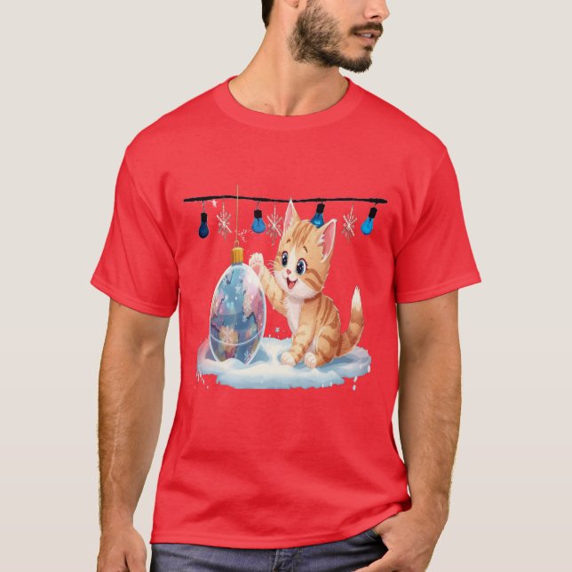 Cute Christmas Kitten Playing with Ornament  T Shirt (Framsida)