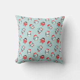 Cute christmas penguins on light blue kudde