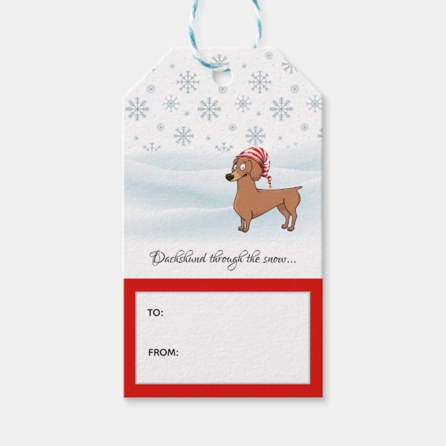 Cute Dachshund genom Snö Ord spelar Helgdag Presentetikett (Framsidan)