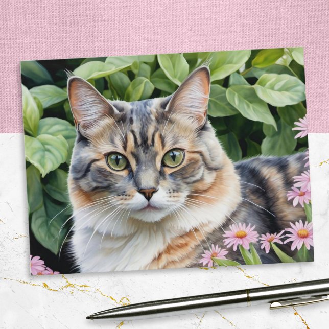 Cute Dilute Tortoiseshell Tortie Cat in Garden Vykort (A postcard of a cute dilute tortoiseshell cat, pictured in a garden with pink flowers)