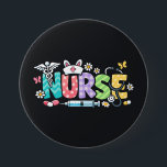 Cute Easter Nurse Medical Humor Knapp<br><div class="desc">Colorful lettering with a nurse hat,  stethoscope,  flowers and playful medical symbols. A cheerful graphic celebrating caring nurses and healthcare professionals during the Easter season with a bright and friendly hospital atmosphere.</div>