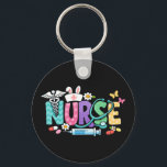 Cute Easter Nurse Medical Humor Nyckelring<br><div class="desc">Colorful lettering with a nurse hat,  stethoscope,  flowers and playful medical symbols. A cheerful graphic celebrating caring nurses and healthcare professionals during the Easter season with a bright and friendly hospital atmosphere.</div>
