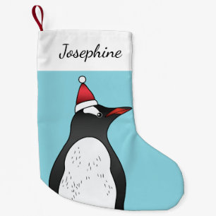 Cute Gentoo Penguin som bar en tomhat på blå Liten Julstrumpa