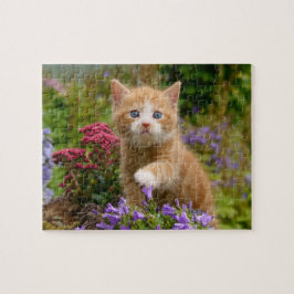 Cute ginger kitten i en trädgård pussel
