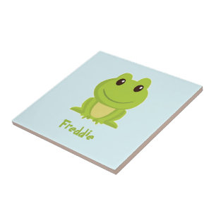 Cute grönt groda på blått kakelplatta