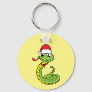 Cute grönt snake med Santa tecknad Nyckelring