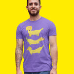 Cute Gult Banana Hundar Graphic T Shirt<br><div class="desc">Denna roligt illustrerar illustrationer av tre hundar som är tillverkade av gult bananer eller hundar.</div>
