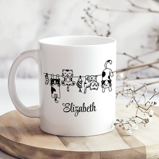 Cute Hanging Kittens Custom Name Kaffemugg (Cute Hanging Kittens Custom Name Coffee Mug on a sunny boho kitchen table with tiny dried flowers)