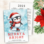 Cute Julberry & Bright Ice Skating Penguin Julkort<br><div class="desc">Den här personligens söta julkort har en glad iskäggarpenguin i en röd julhatt,  scarf och figur-skridskor på en snöblå vattenfärgsbakgrund. En "Merry & Bright"-text och malltext för hälsning,  namn och ett år finns på kortets framsida. Baksidan har Söndag till lördag 2025-kalender.</div>