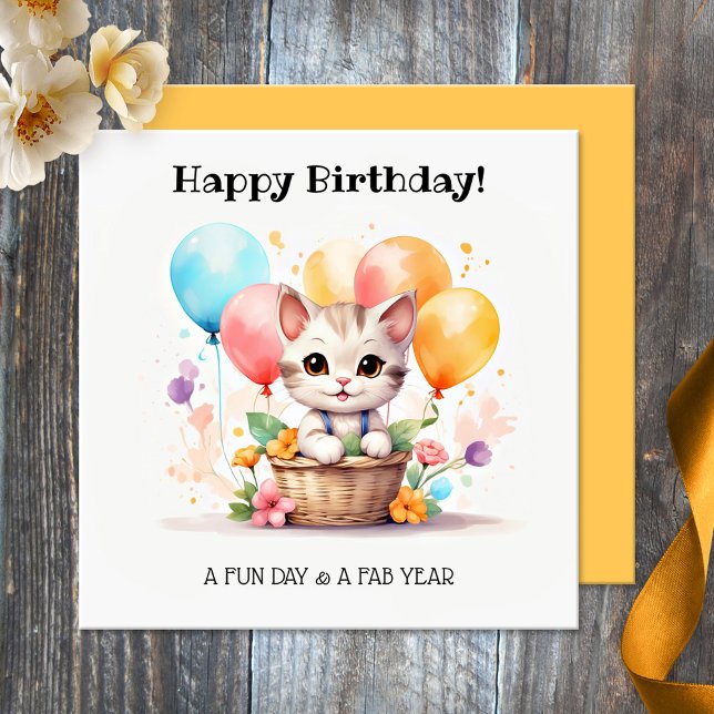 Cute Kattunge med ballonger Grattis på födelsedage Kort (Birthday card featuring a cut kitten in a basket with colorful balloons. Nice for a cat loving girl)