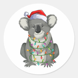 Cute koala in christmas ljus runt klistermärke