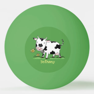 Cute kon i grönt fält tecknad illustration pingisboll