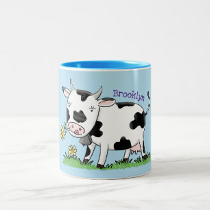 Cute kon i grönt fält tecknad illustration Två-Tonad mugg