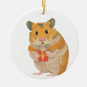 Cute lilla julhamster som håller en present julgransprydnad keramik