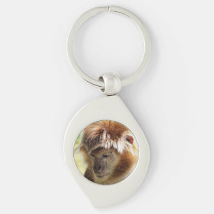 CUTE LITTLE MONKEY SWIRL SILVERFÄRGAD NYCKELRING