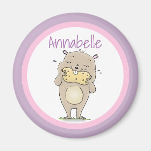 Cute lycklig hamster som äter en tecknad av jordnö magnet