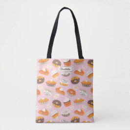 Cute muffinsar, donationer och paj på ljus rosa tygkasse