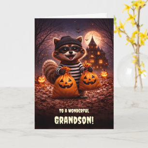 Cute och rolig tvättbjörn på halloween för sonson kort