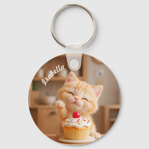 Cute Orange Kitten med en cupkaka Nyckelring